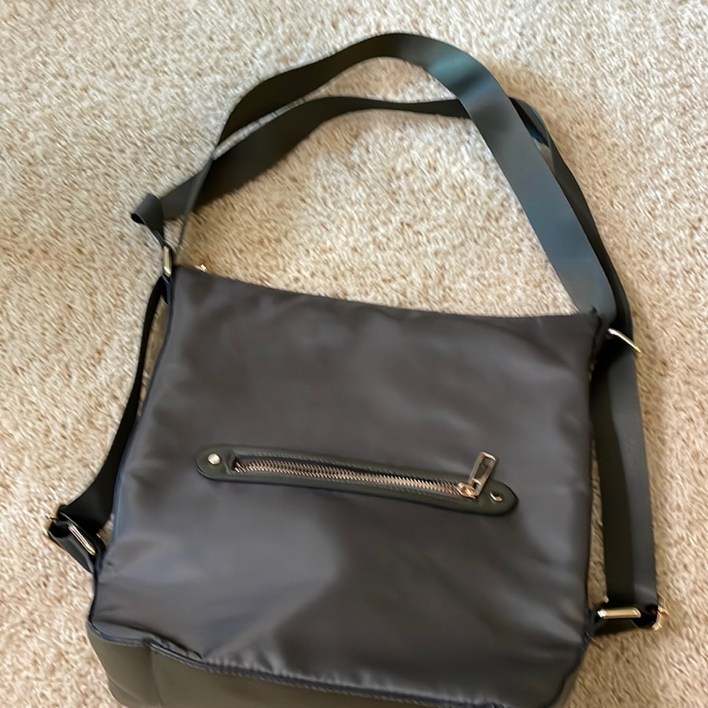 New without tags .. olive green nylon material